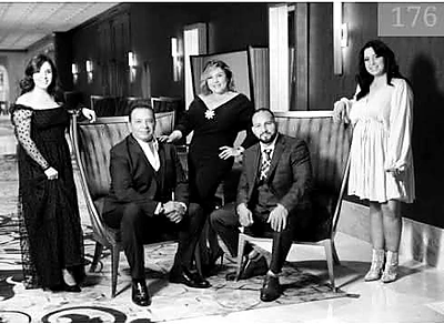 Art Loera with family in formal portrait. Reno trusted mortgage Branch Manager since 1999.