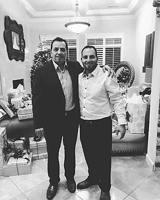 Art Loera with son during the holidays. Family-first lending in Reno NV.