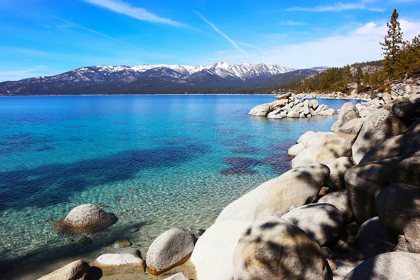 Sand Harbor at Lake Tahoe, Nevada in daylight, turquoise water and granite boulders. Lake Tahoe home loans and mortgage pre-approval with Art Loera, PRMG.