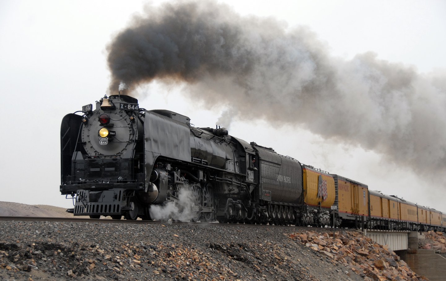 Union Pacific 844 steam locomotive on the Elko to Sparks run at Painted Rocks, Nevada. Rail heritage for Sparks, the Rail City. Sparks home loans with Art Loera, PRMG.